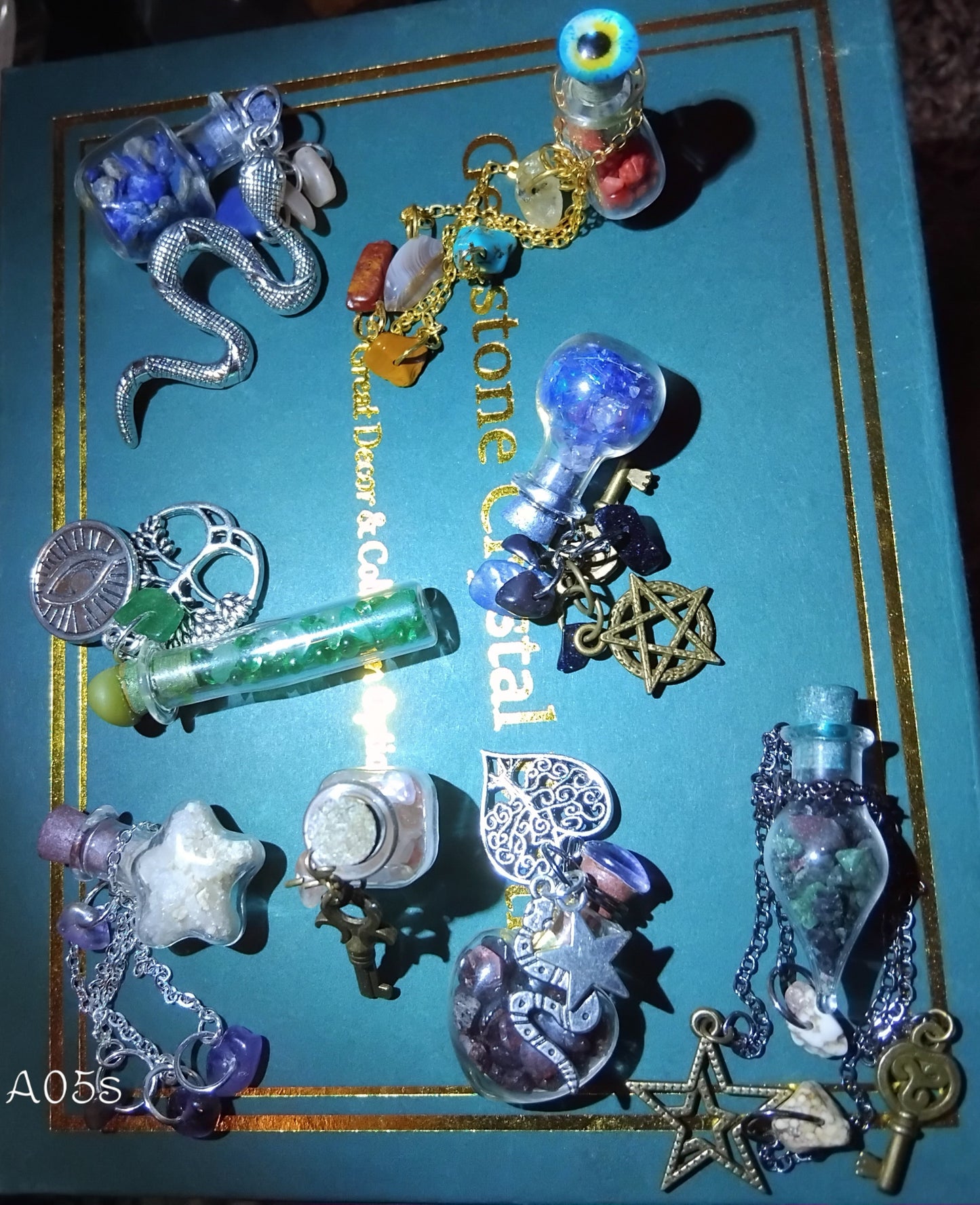 Handmade charms and bottles filled with your choice of minerals and crystals, magical trinkets