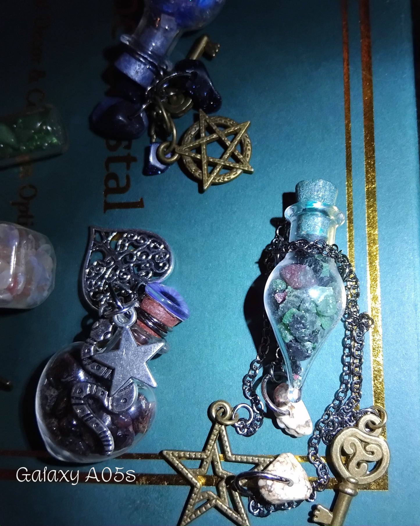 Handmade charms and bottles filled with your choice of minerals and crystals, magical trinkets