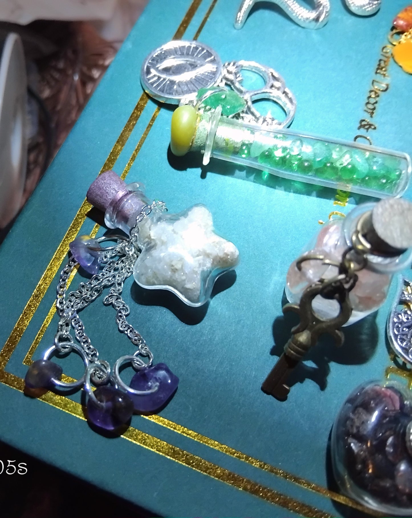 Handmade charms and bottles filled with your choice of minerals and crystals, magical trinkets