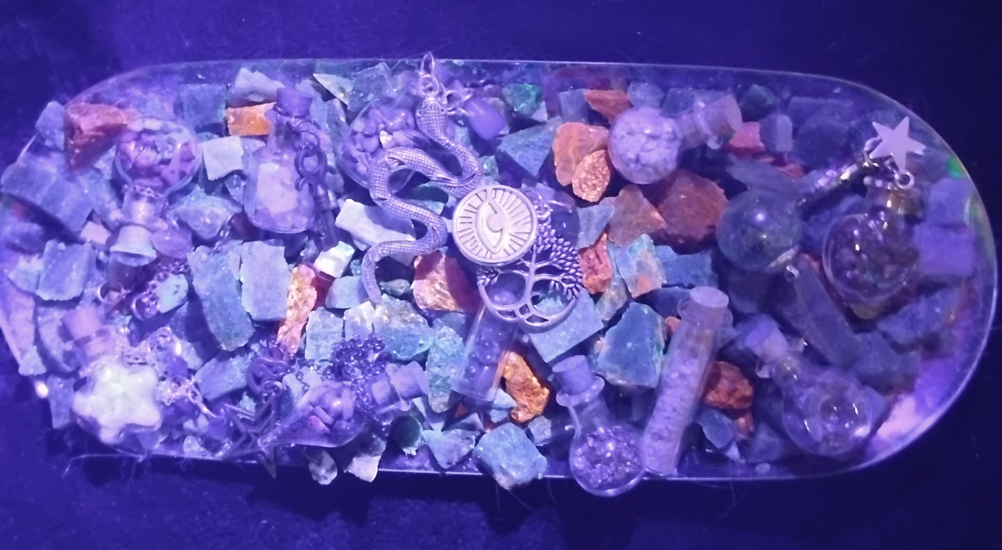 Handmade charms and bottles filled with your choice of minerals and crystals, magical trinkets
