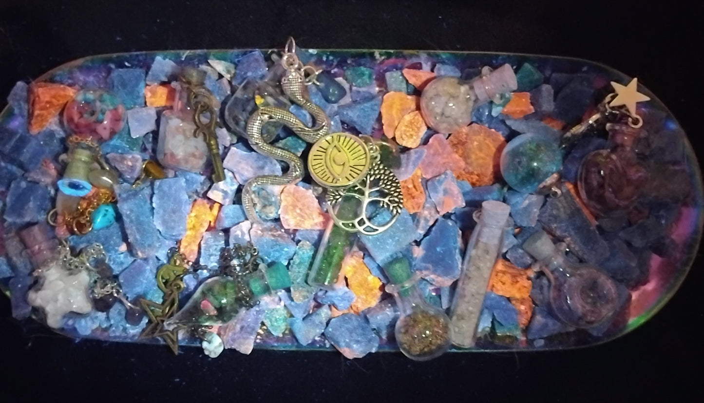 Handmade charms and bottles filled with your choice of minerals and crystals, magical trinkets