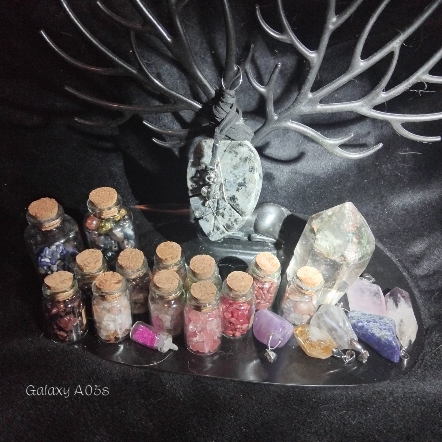 Handmade charms and bottles filled with your choice of minerals and crystals, magical trinkets