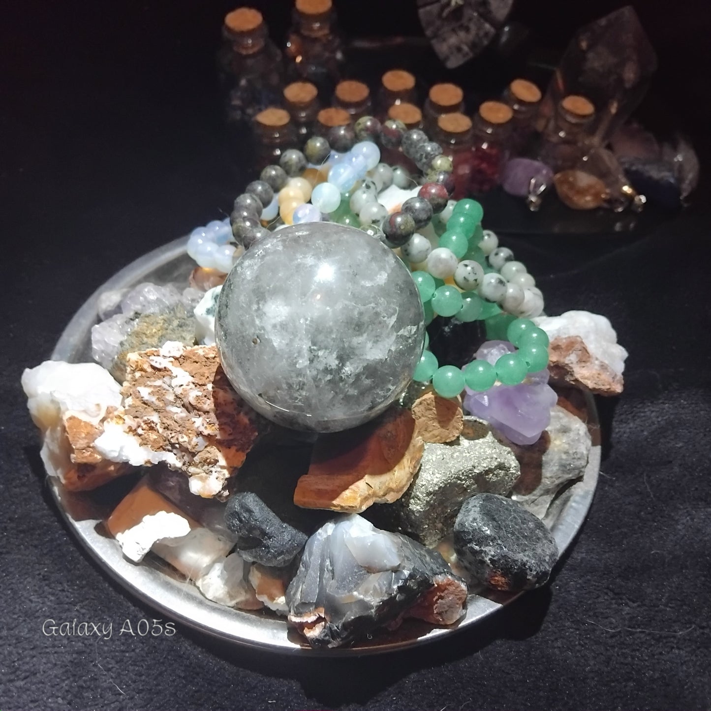 Handmade charms and bottles filled with your choice of minerals and crystals, magical trinkets