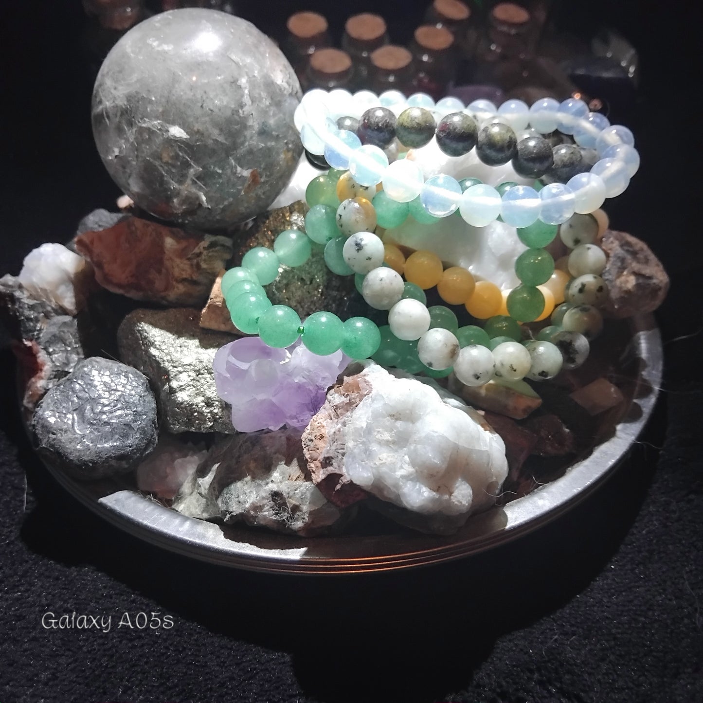 Handmade charms and bottles filled with your choice of minerals and crystals, magical trinkets